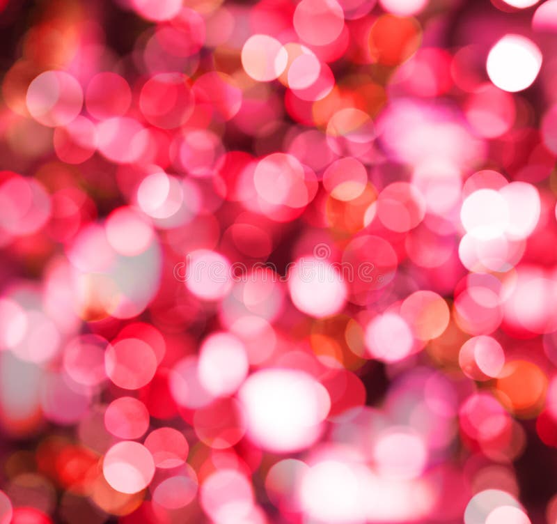 Red sparkle background with abstract bokeh glitter light.