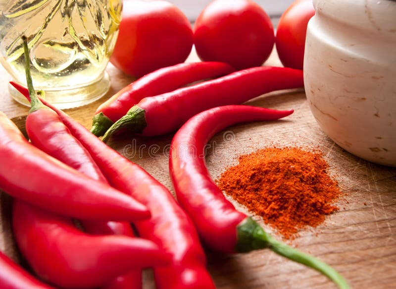 Red spices on a wooden table