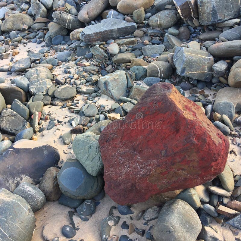 Red Stone, Unusual Stone, Bright, Stand Out from the Crowd Stock Photo -  Image of special, nature: 133878530