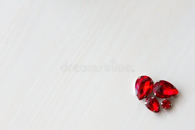 Red Stones Crystals Beads on a White Wooden Background in the Corner Stock Image Image of