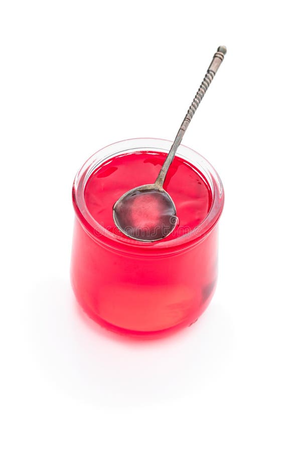 Red Strawberry Jelly in a Glass Jar Isolated on White Stock Image