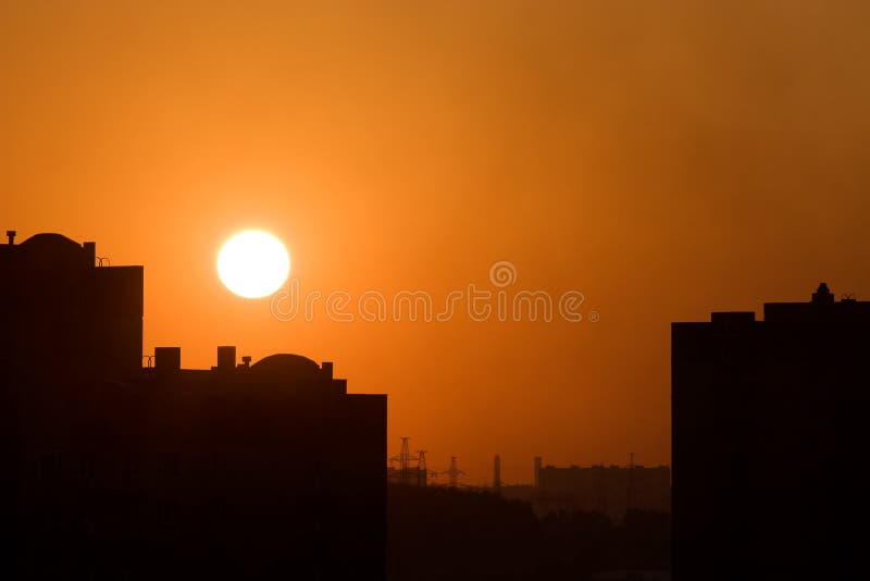 Red sunset in a city