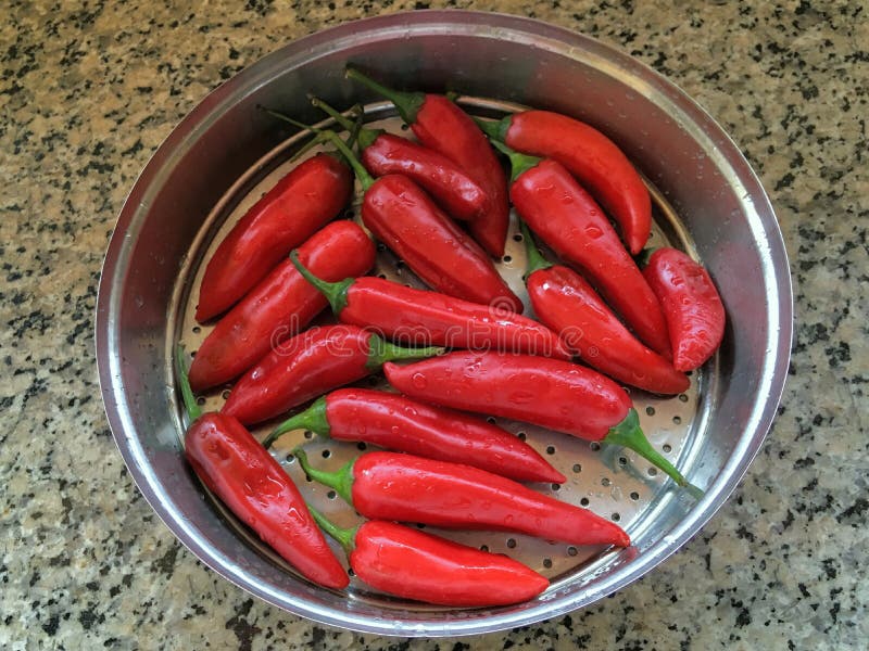 Red tabasco pepper and yellow lime for pickle kalyan maharashtra INDIA stock image Red tabasco pepper and yellow lime for pickle kalyan maharashtra INDIA stock image