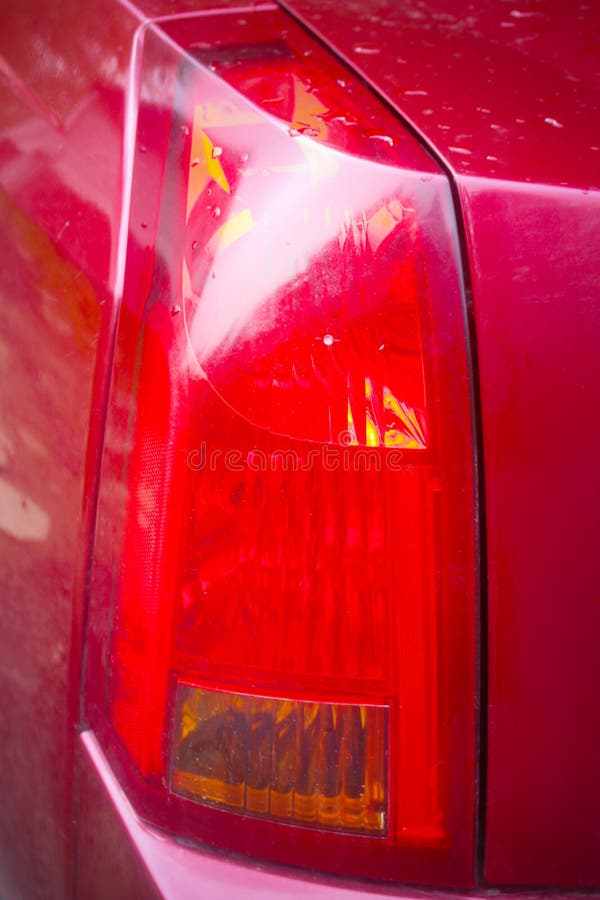 Red Tail Light of a Burgundy Parked Car Stock Image Image of stop