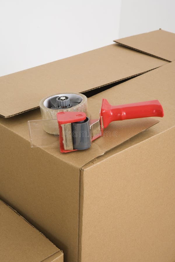 Red tape gun stock image. Image of room, home, brown, horizontal 5003409