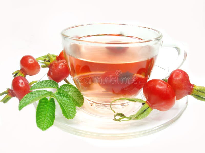 Red tea with wild rose hip berries