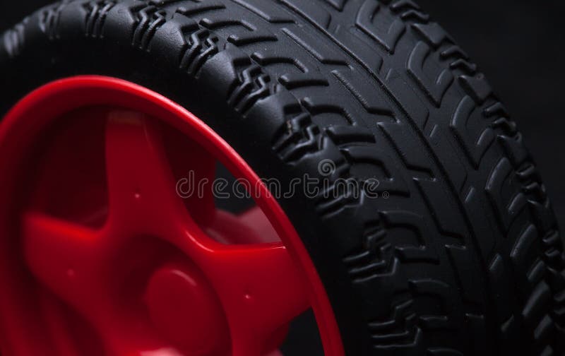 Red toy car wheel stock image. Image of black, yellow 35665521