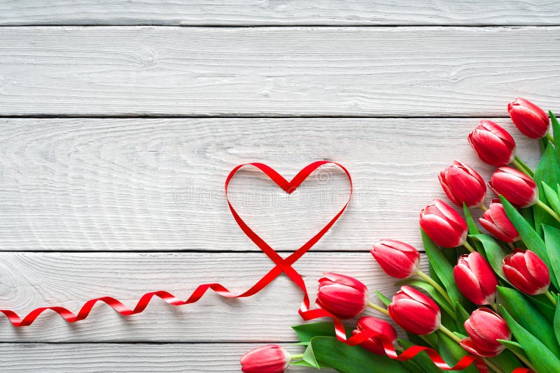 Heart from Red Tulips Flowers on Blue Wooden Table for March 8 ...