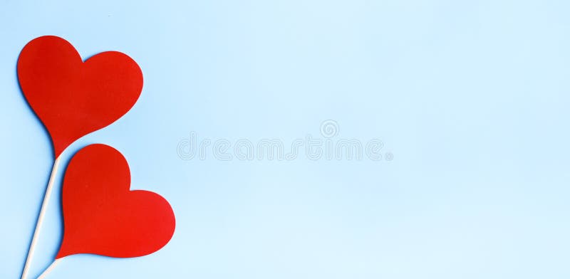 Red Valentine Hearts on Pastel Blue Background from Above Stock ...
