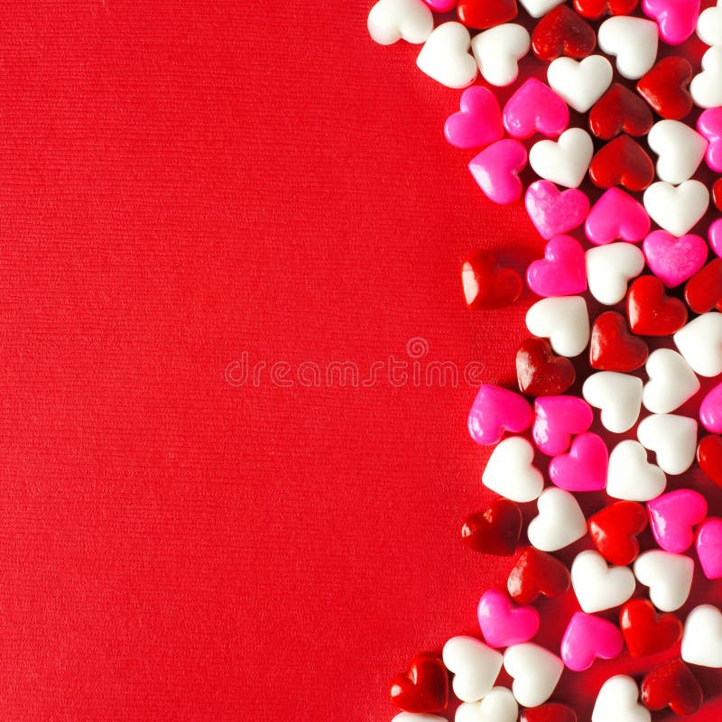 Red Valentines Day background with candy heart border