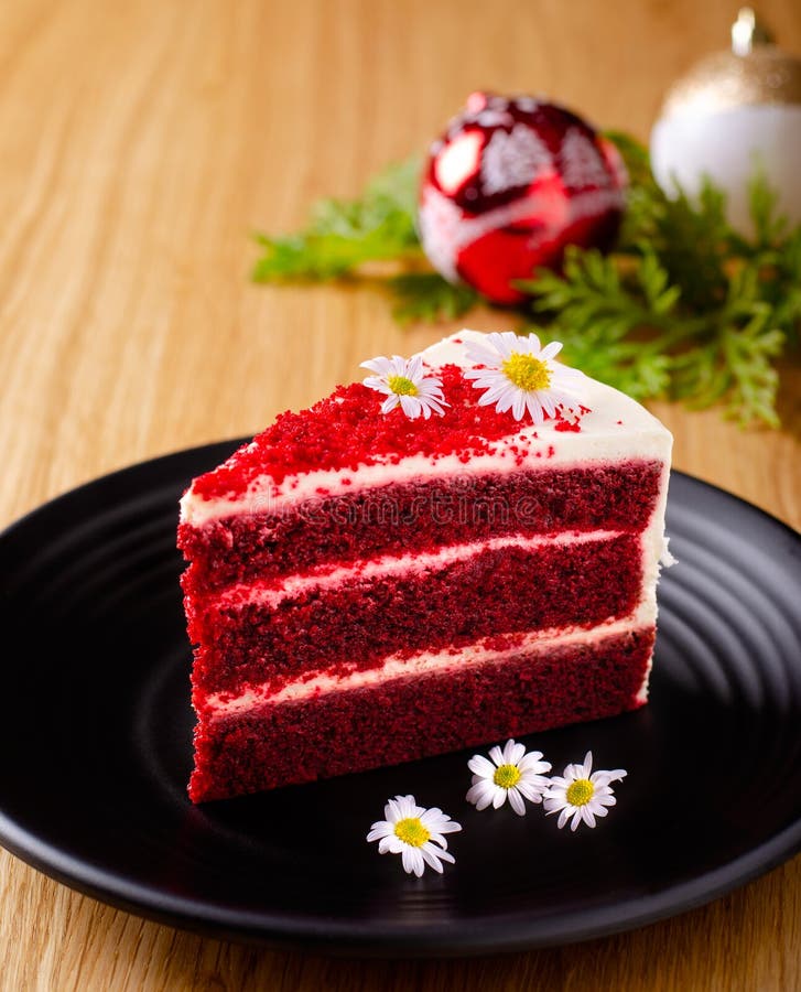 Red Velvet Cake on Black Color Plate for Celebrations and Put on Wooden