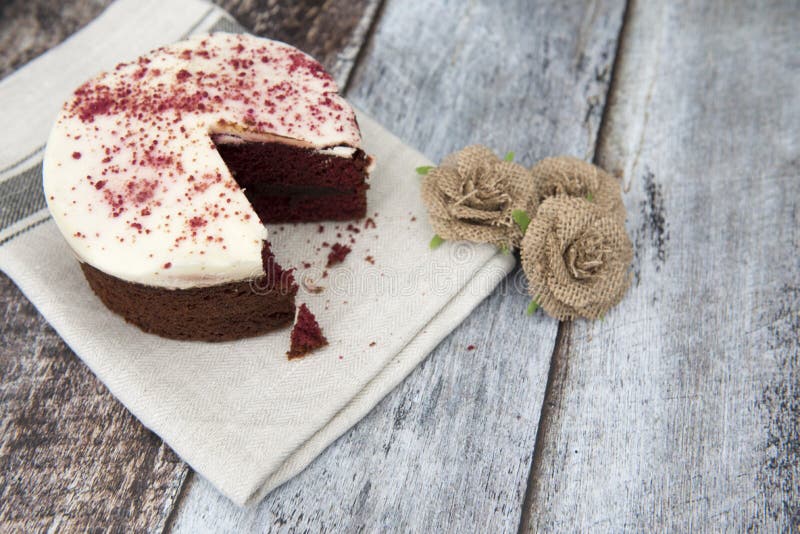 Red velvet cake with a slice missing stock photos Red velvet cake with a slice missing stock photos