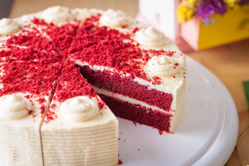 Red velvet cake. On wood table with morning scene royalty free stock photo