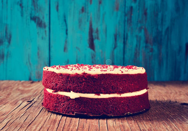 Red velvet cake on a wooden table, filtered stock images