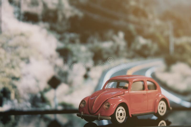Red vintage car on the road stock photography Red vintage car on the road stock photography
