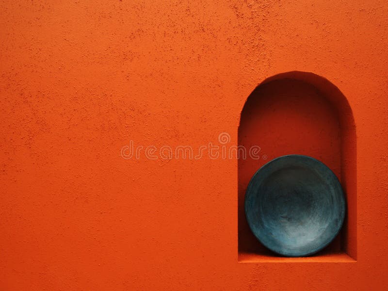 Red wall with blue plate