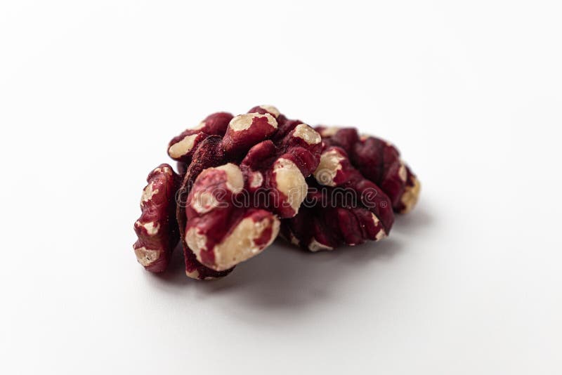 Red Walnuts on a White Background Stock Photo - Image of food, light
