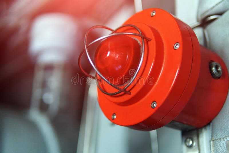 Fire Alarm with Red Warning Light of an Emergency Beacon at an