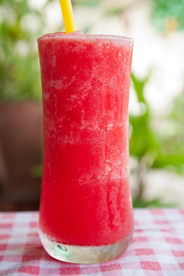 Red watermelon Juice in garden