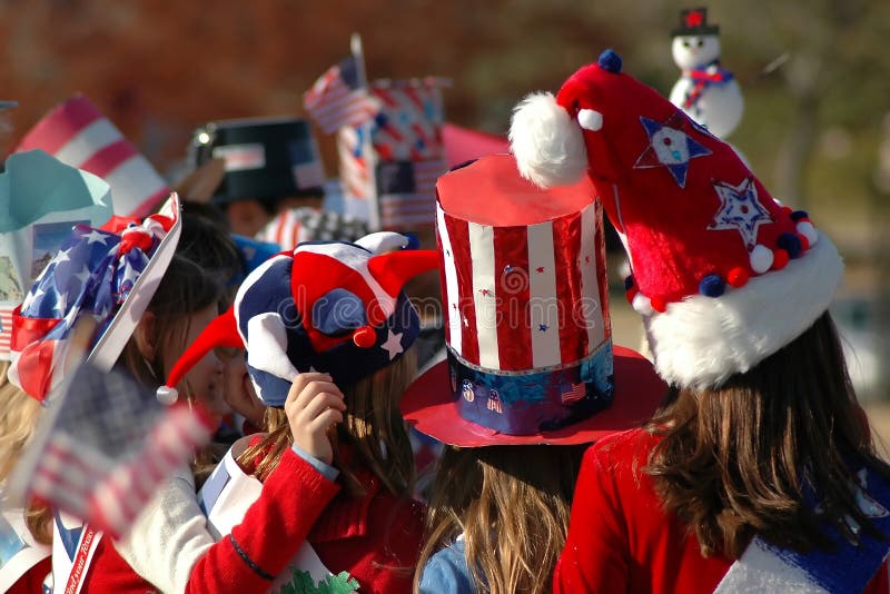 Girls wearing Red, White and Blue Hats