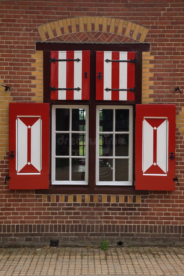 Red and White Decorations on the Doors and Window Shutters of De Haar