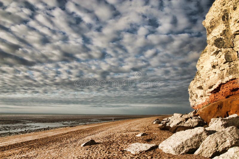 Red and white limestone cliffs stock images