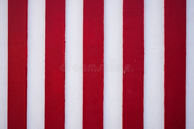 Red and White Vertical Stripes Background Pattern. an Abstract Colorful Striped Texture or