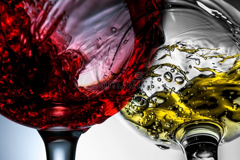 Red and white wine splash in wineglasses close-up macro royalty free stock photography Red and white wine splash in wineglasses close-up macro royalty free stock photography