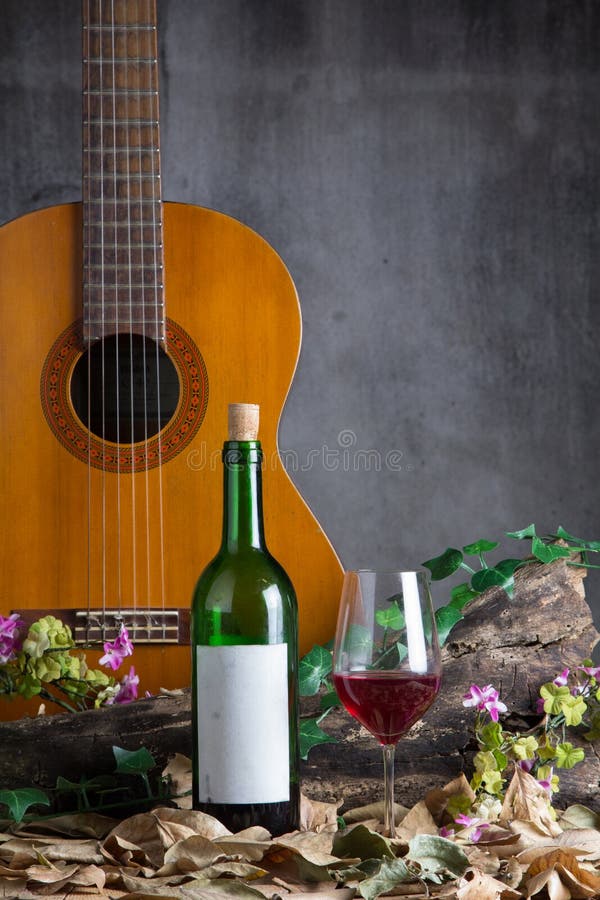 Glass Wine Bottleneck Guitar Slide Stock Photo - Image of flower