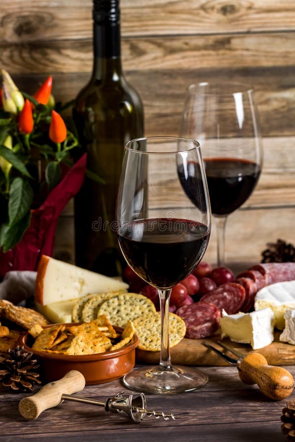 Red wine and cheese spread stock image. Image of closeup 160918417
