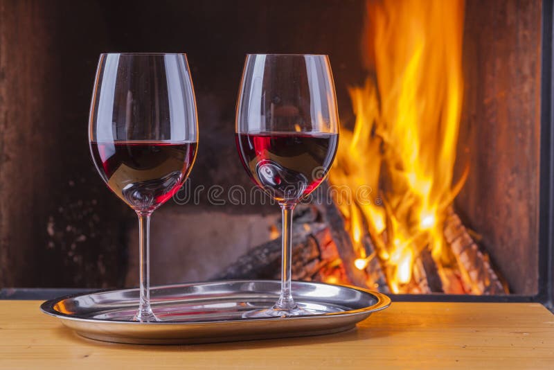 Red wine at fireplace stock image. Image of wood, relaxing 33769901