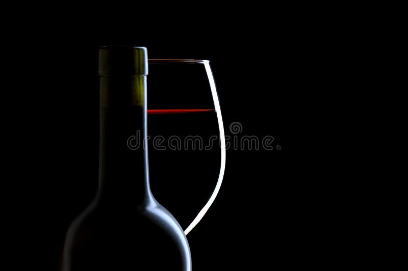 Red Wine Glass and Bottle on Black