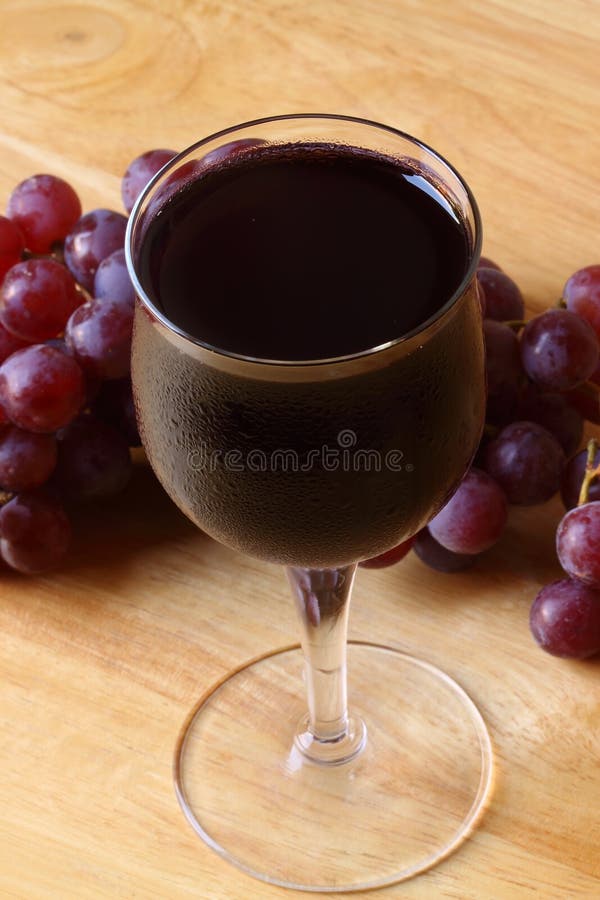 Red wine with grapes