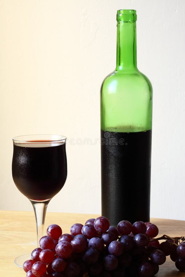 Red wine with grapes