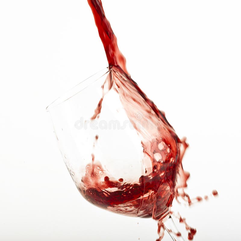 Red wine splash on a glass. stock images