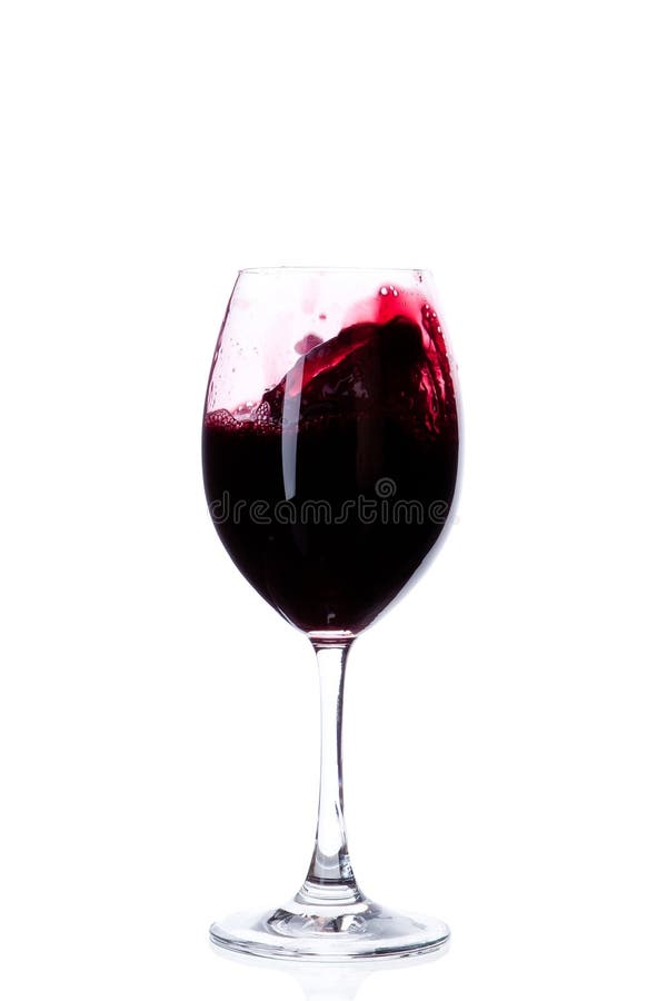 Red wine in a wine glass isolated on white