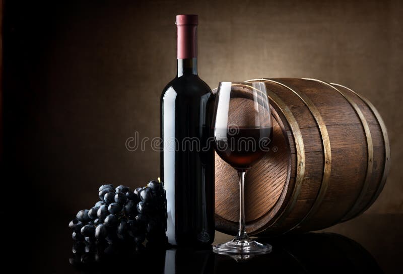 Red wine and wooden barrel