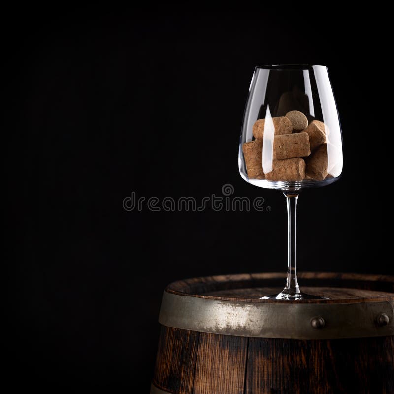 Red Wineglass with Wine Corks on Old Wine Barrel Stock Photo Image of
