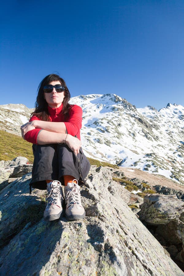 Red Woman Sitting Relaxing on Peak Mountains Stock Photo - Image of ...