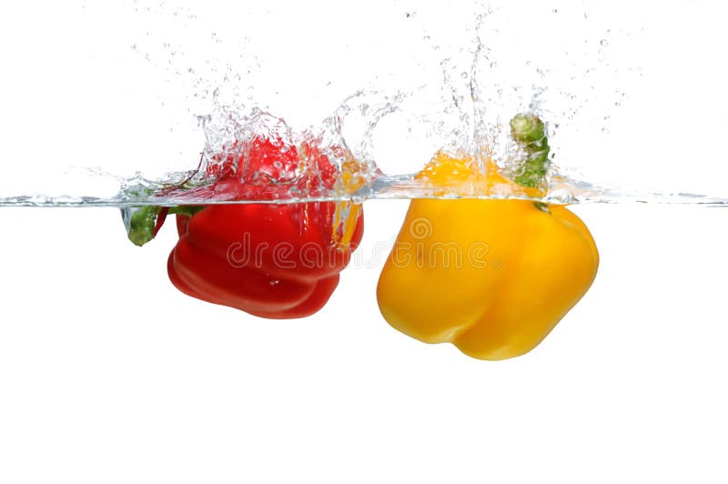 Red and yellow Bell Pepper splashing