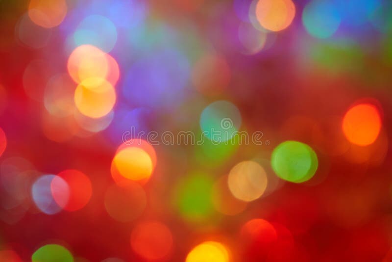 Red Yellow Blue Green Blurred Points of Light on a Red Blurred