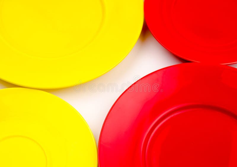 Red and yellow empty plate stock image. Image of fork 37642785