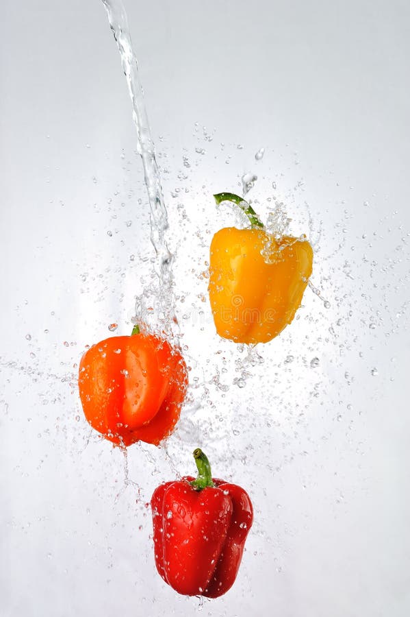 Peppers and water splash stock image. Image of underwater 29747399