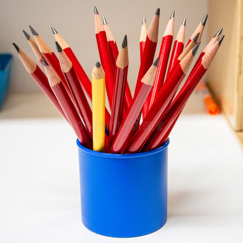 Red and Yellow School Pencils in Blue Pencil Cup Stock Photo - Image of