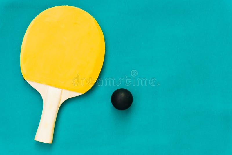 Red and Yellow Table Tennis Rackets with Black Balls,.table Tennis Rackets and Balls on Table