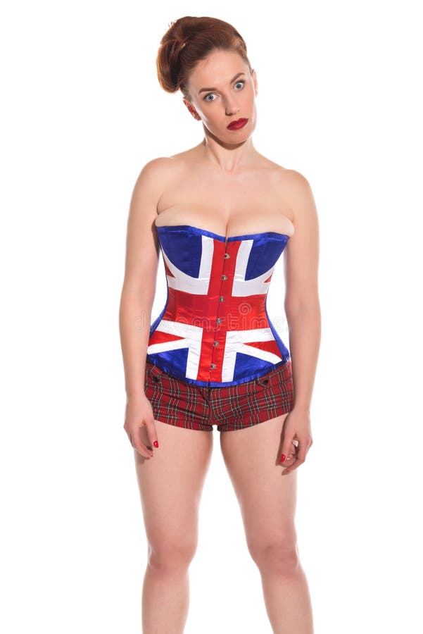 Pretty young redhead in a Union Jack corset.