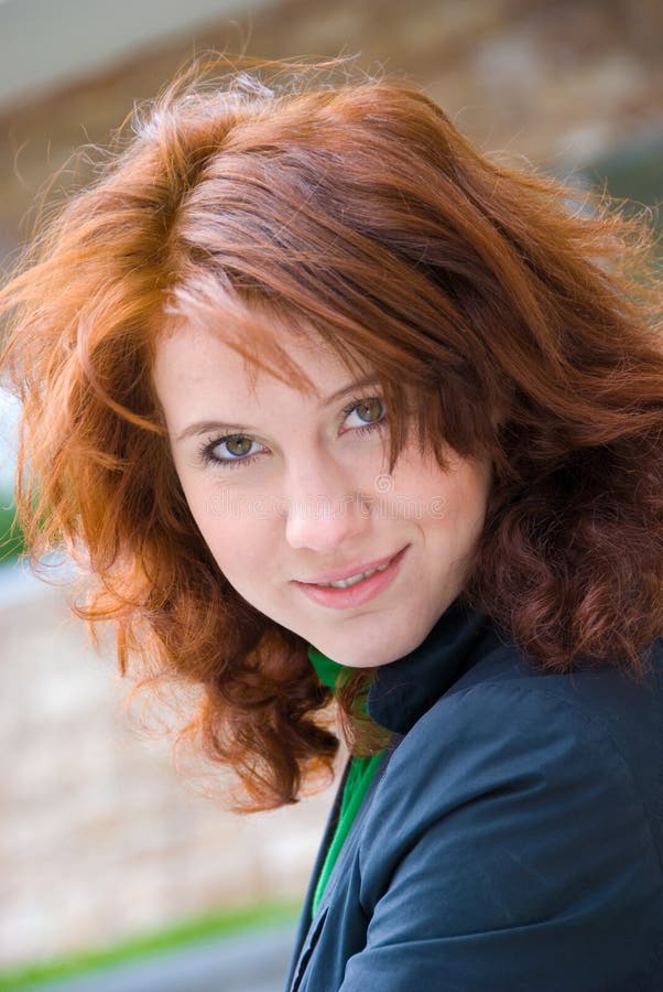 Redhead curly girl stock photo