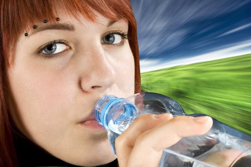 Redhead drinking water