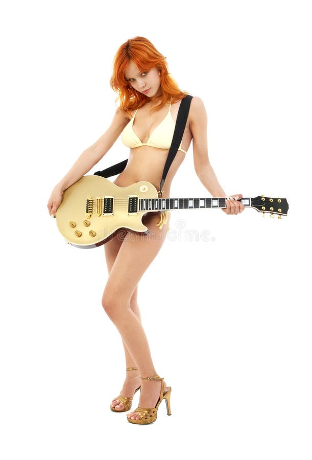 Redhead with golden guitar on