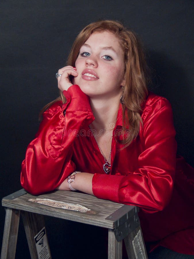 Redhead in Red Shirt Smiles